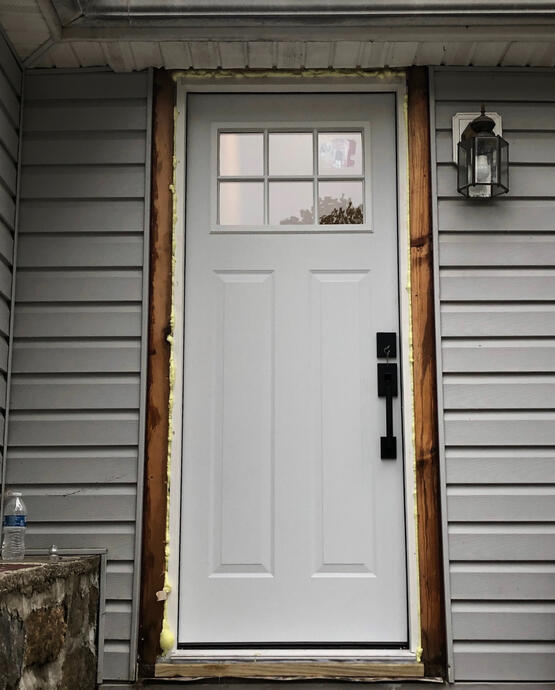 Progress image of exterior door framing & insulation