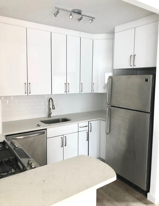 Renovation of cabinetry, sink, and tiles