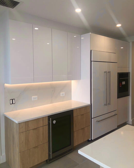 Two-toned cabinetry and all new appliances