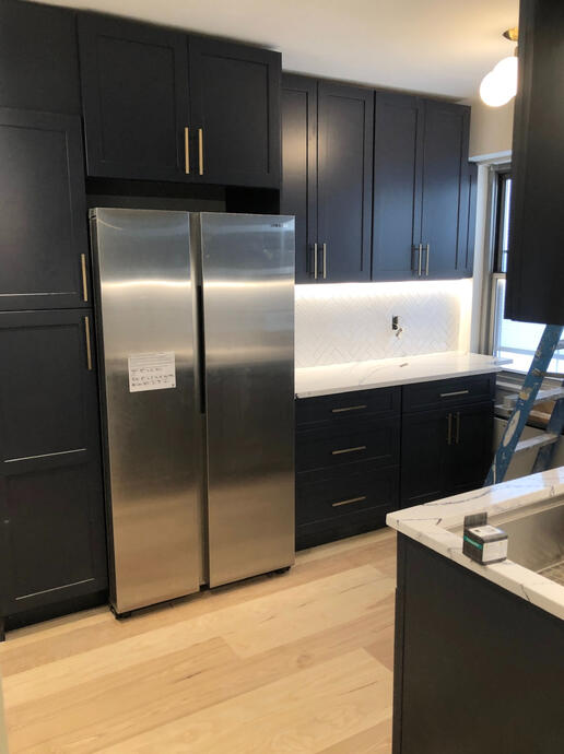 Custom cabinets with new counter & backsplash