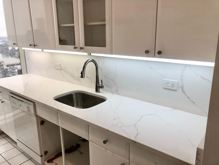 Small kitchen renovation with modern under cabinet lighting