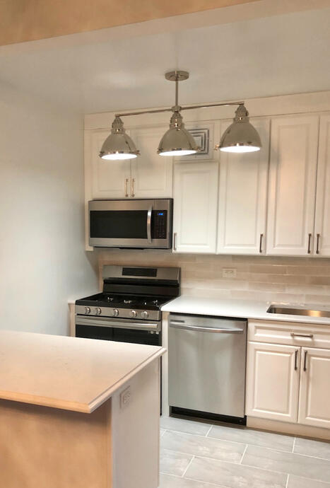 Complete renovation with new island and pendants