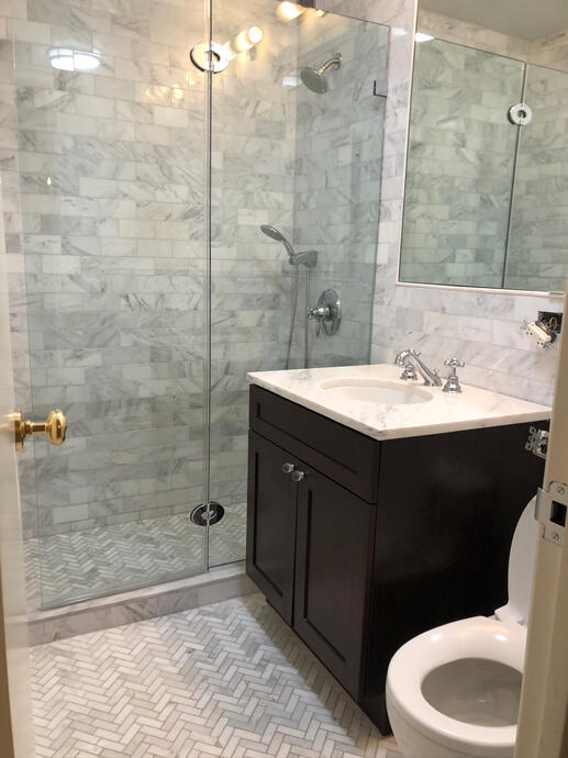 Walk-in shower floor and wall tiles