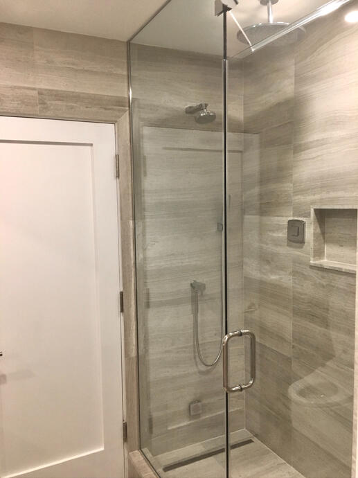Walk-in shower fixtures and glass