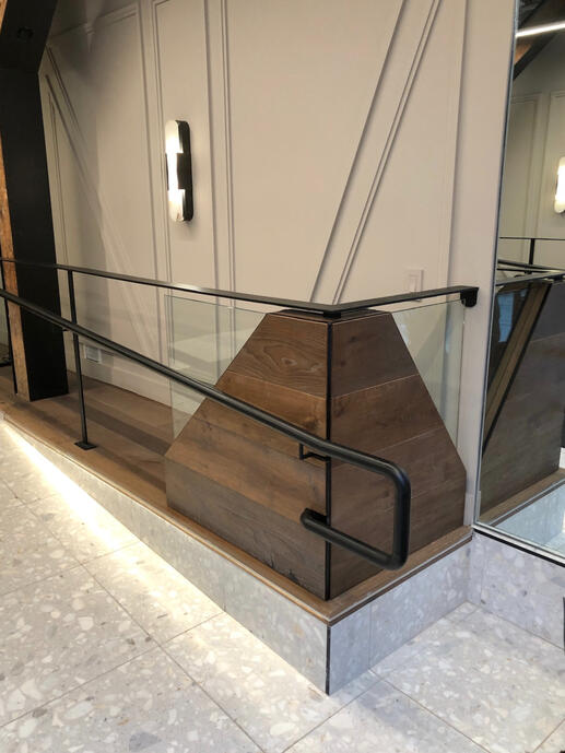 Detail of custom built railing in lobby