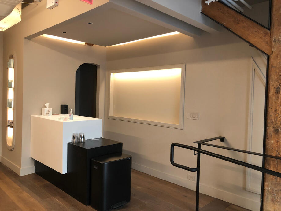 New reception cabinetry and recessed shelving